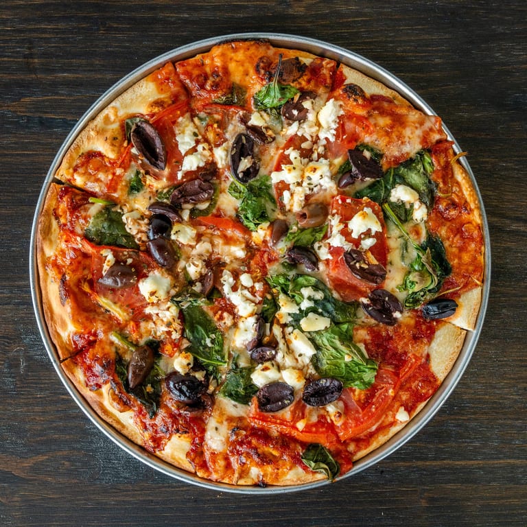 Indulge in Our Meat Lovers Pizza