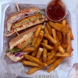 Veg Schezwan Burger with Fries